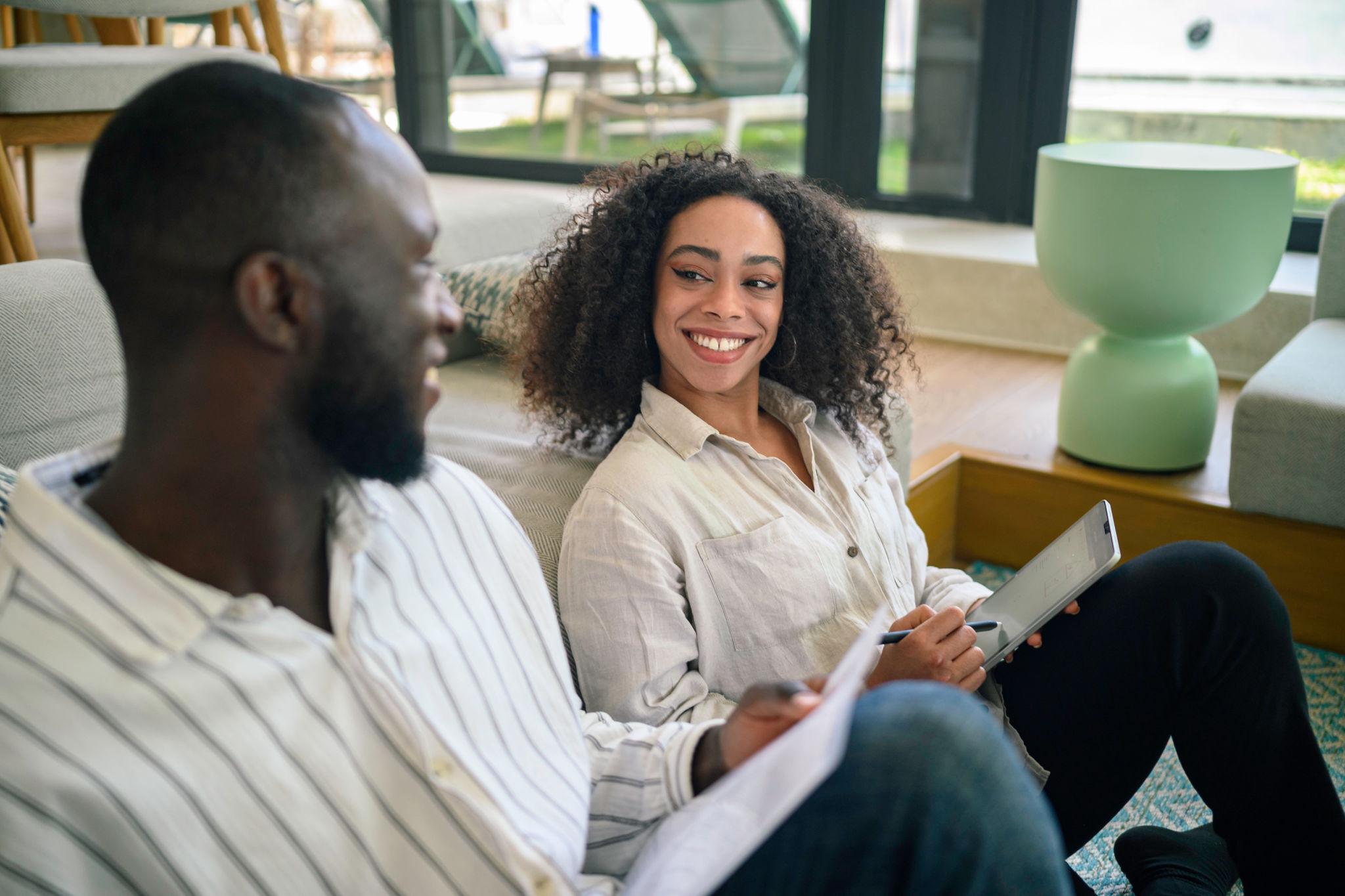Professionals collaborating on business systems and compliance